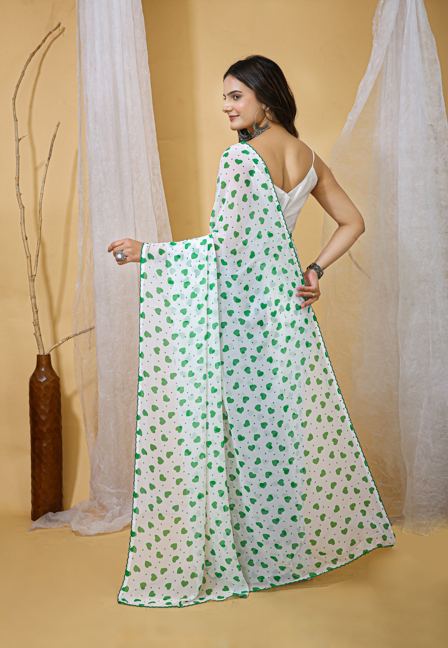 Sea Green Color Georgette Fabric Heart Print Saree With Blouse Piece