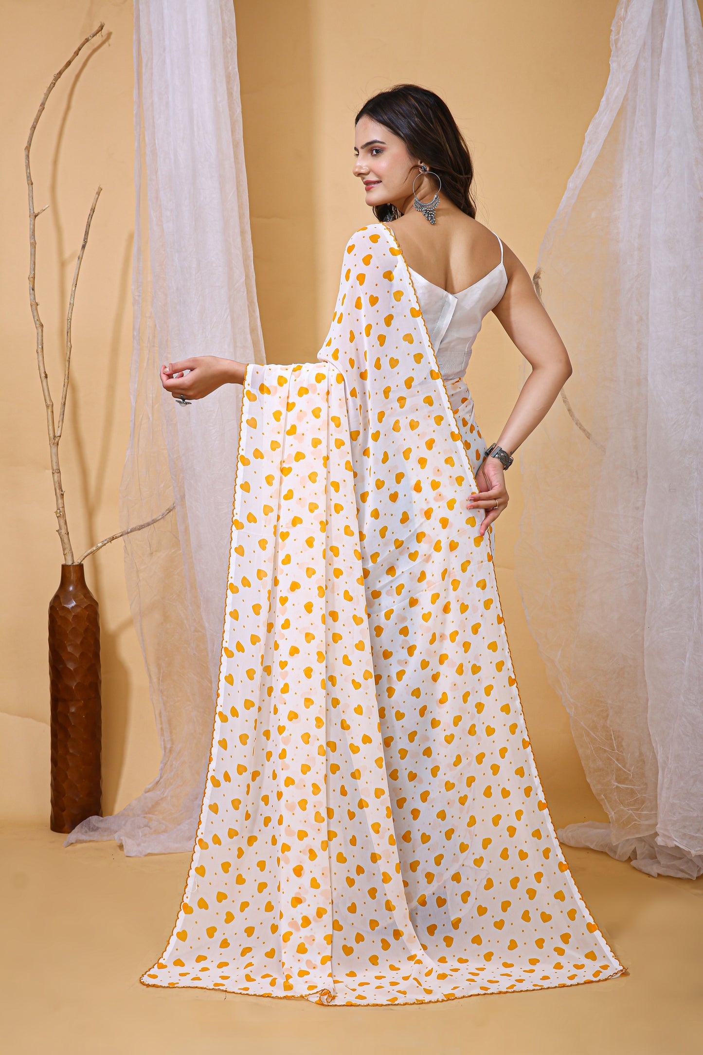 White & Yellow Color Georgette Fabric Heart Print Saree With Blouse Piece