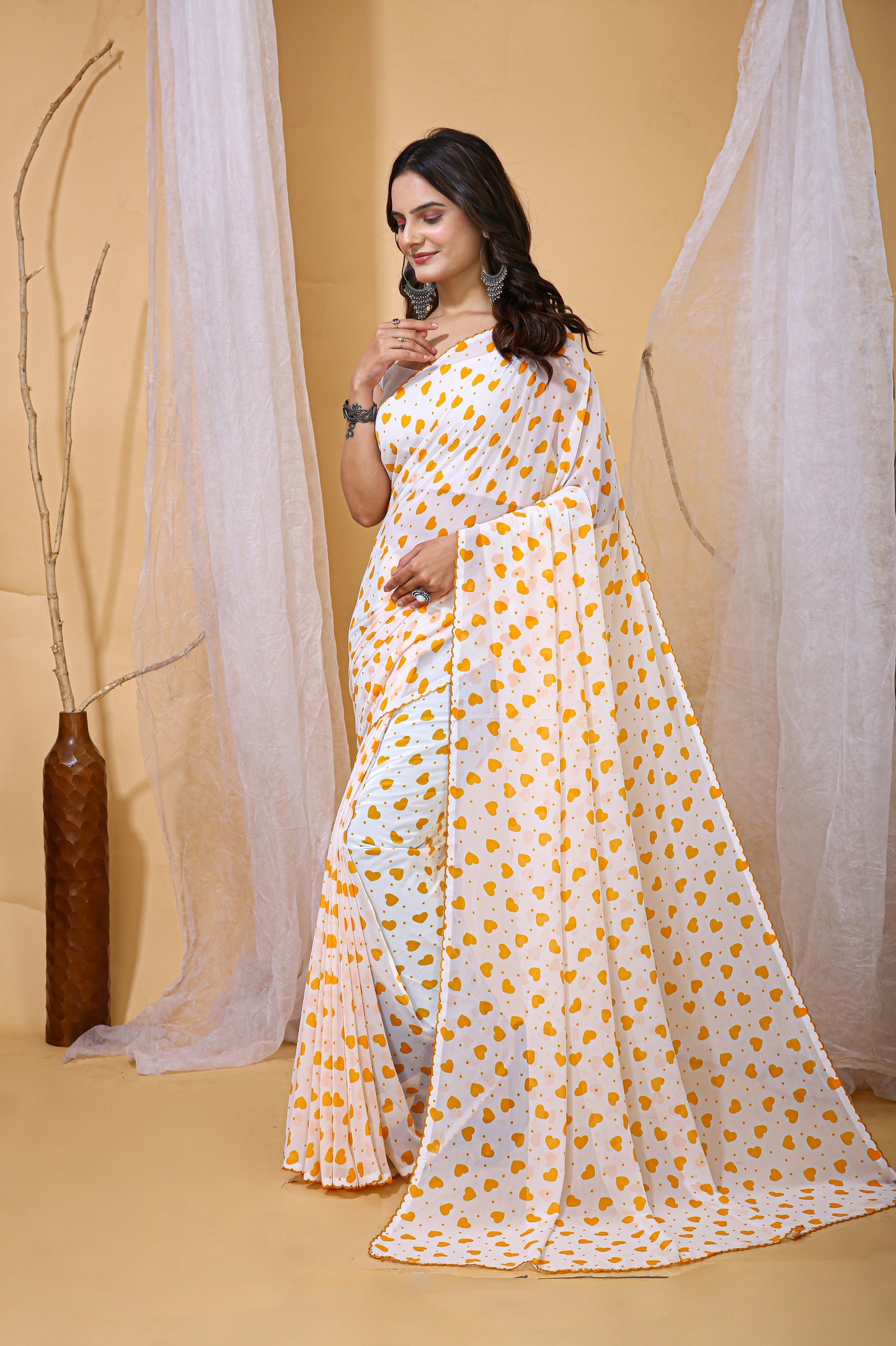 White & Yellow Color Georgette Fabric Heart Print Saree With Blouse Piece