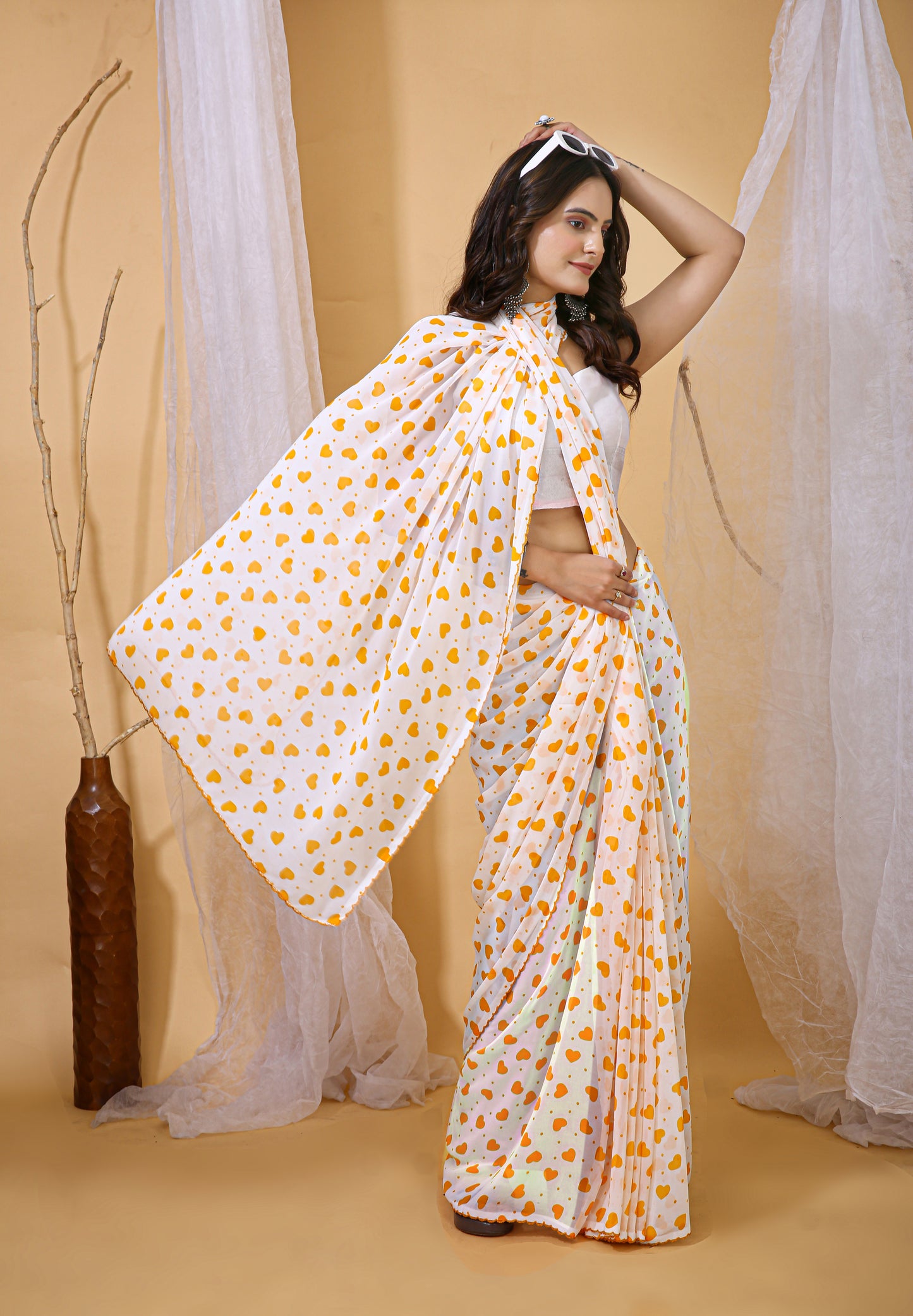 White & Yellow Color Georgette Fabric Heart Print Saree With Blouse Piece