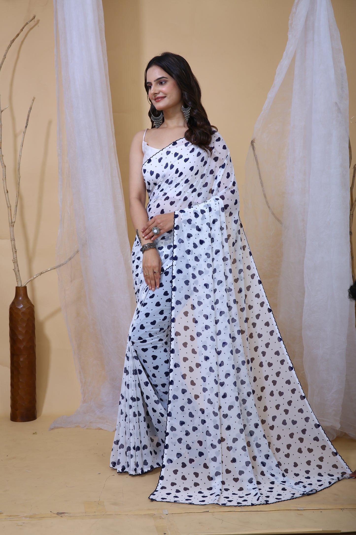 White & Blue Color Georgette Fabric Heart Print Saree With Blouse Piece