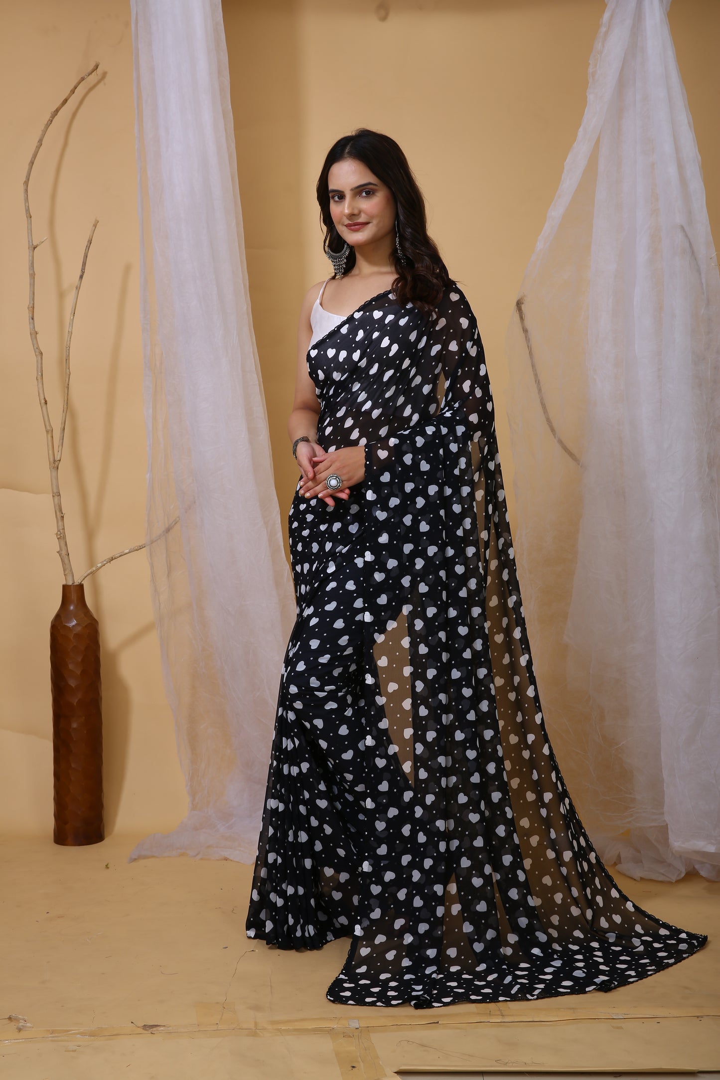 Black Color Georgette Fabric Heart Print Saree With Blouse Piece