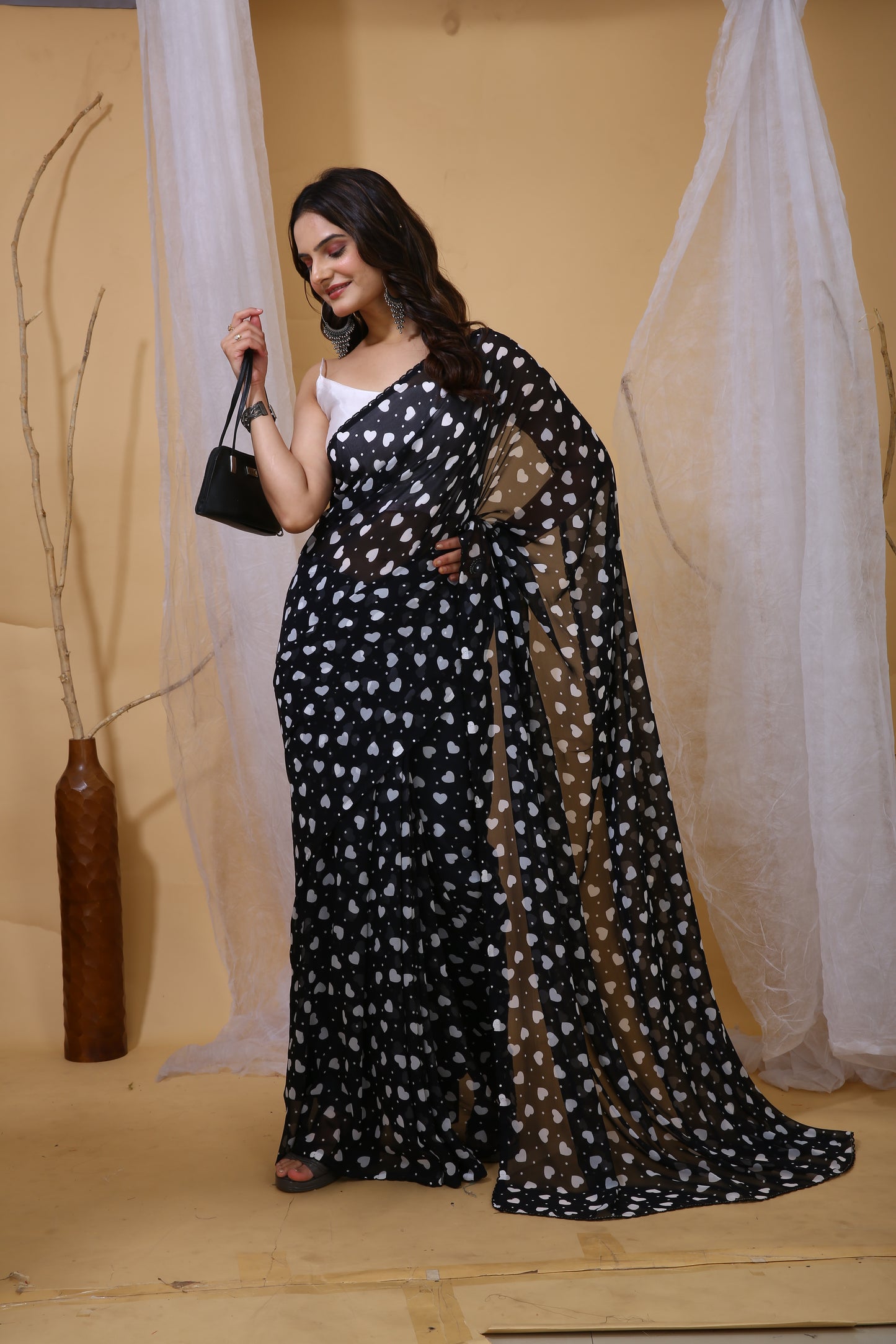 Black Color Georgette Fabric Heart Print Saree With Blouse Piece