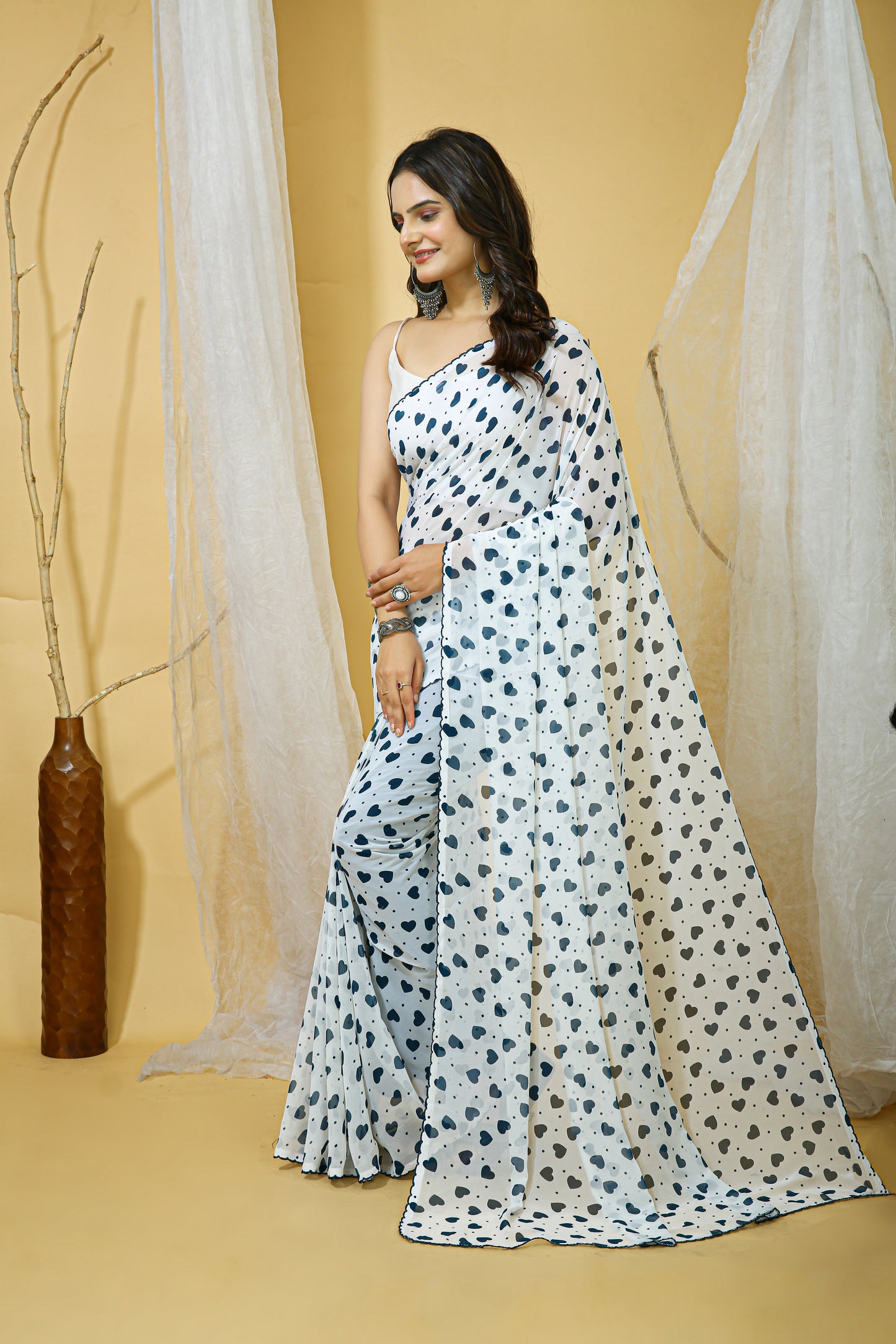 White & LiteBlue Color Georgette Fabric Heart Print Saree With Blouse Piece