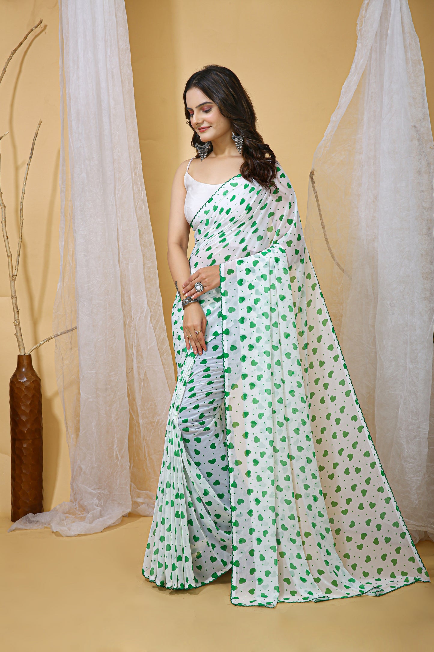 Sea Green Color Georgette Fabric Heart Print Saree With Blouse Piece